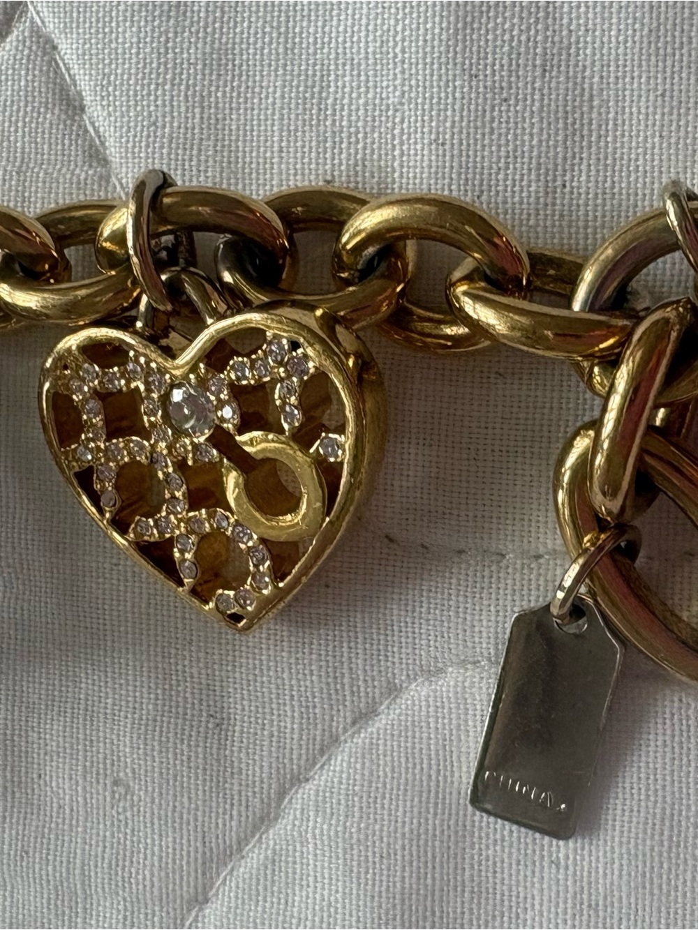 Coach Gold and Silver Tone Charm Bracelet with Crystal Accents - Picture 4 of 9